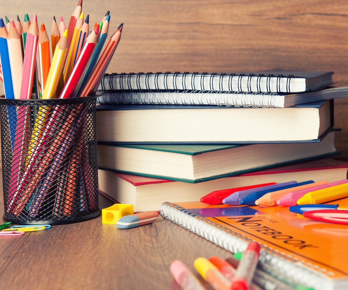 Colourful stationery arranged on a desk